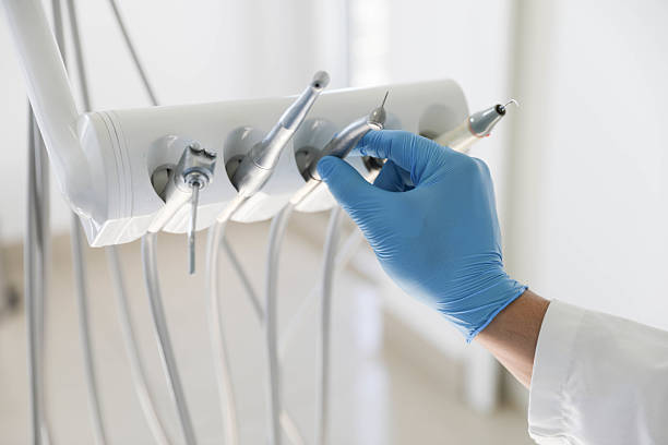 Professional Wisdom Tooth Removal technician working in West Liberty, IA